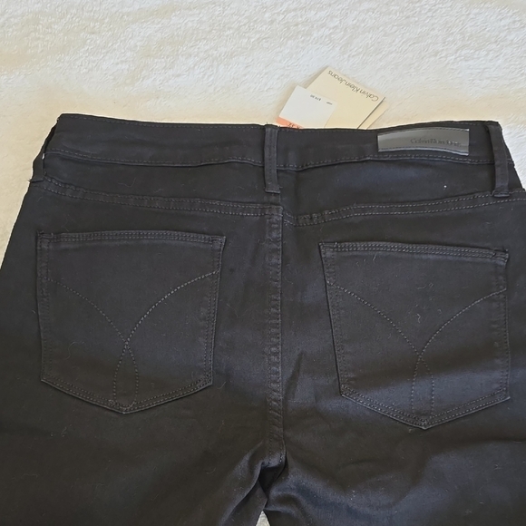 NWT Calvin Klein Black Flare Wide Leg Jeans - Picture 3 of 4